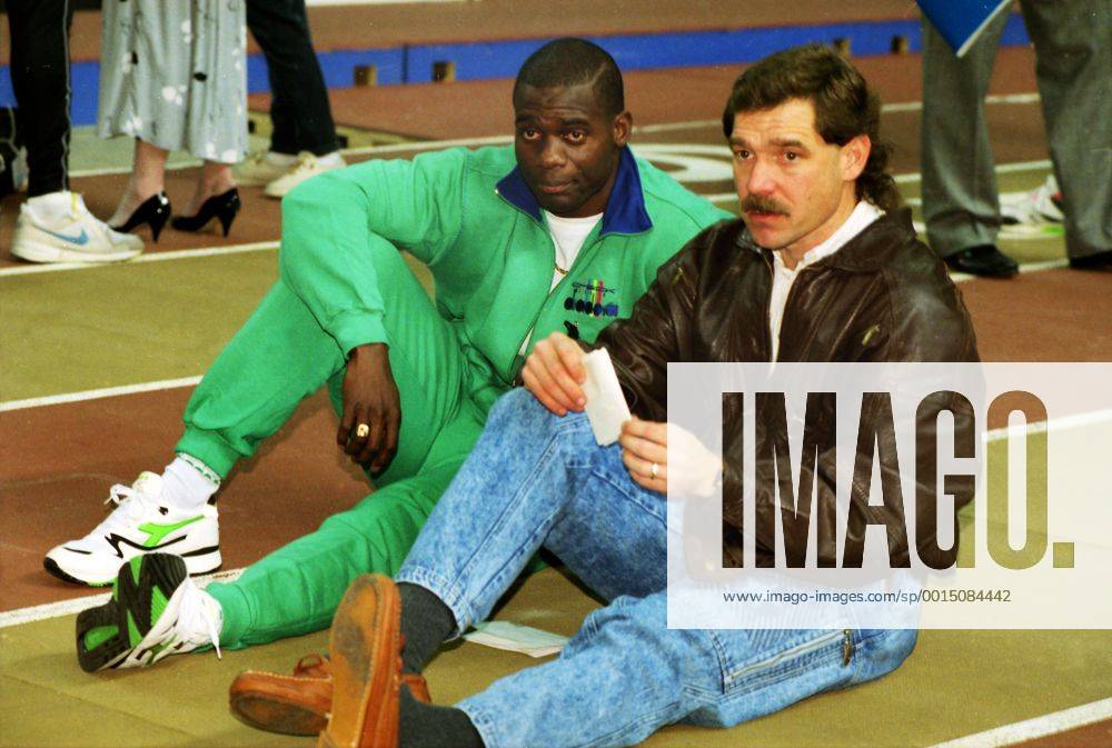 Athletics - 1991 Hamilton Spectator Indoor Games - Ben Johnson Comeback Race Ben Johnson, with coach Loren Loren Seagrave, right, makes his return to the track after serving his drugs suspension after failing the test after the Seoul Olympic 100m final. At the Copps Coliseum Johnson was greeted by the largest crowd to ever attend an indoor Canadian track and field event. More than 17,000 saw him finish second in the 50 metres in 5.77 seconds. 11 01 1991