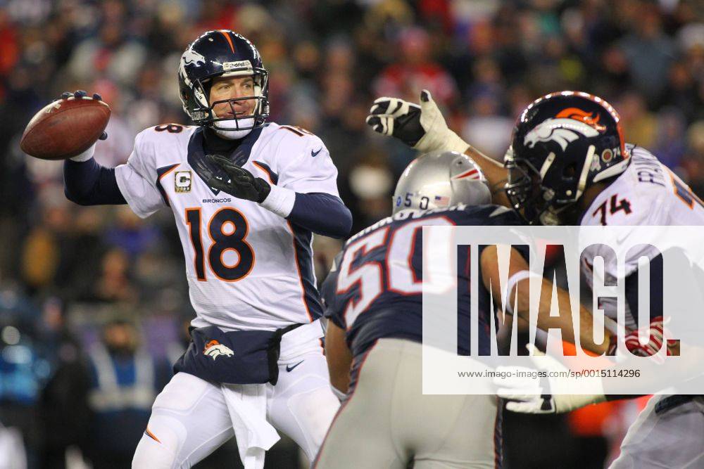 Denver Broncos quarterback Peyton Manning (18) throws a pass in the second quarter against the New England Patriots in Foxboro, Massachusetts on November 24, 2013. BOS2013112405