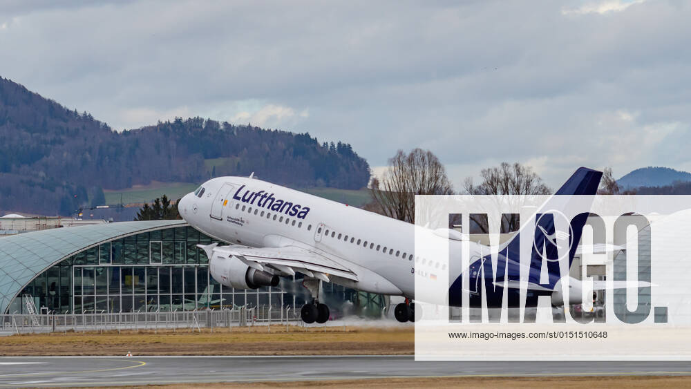 Salzburg, austria, 19 feb 2022, Airbus A319-114, d-ailk operated by lufthansa starting at the airport in front of hangar 7
