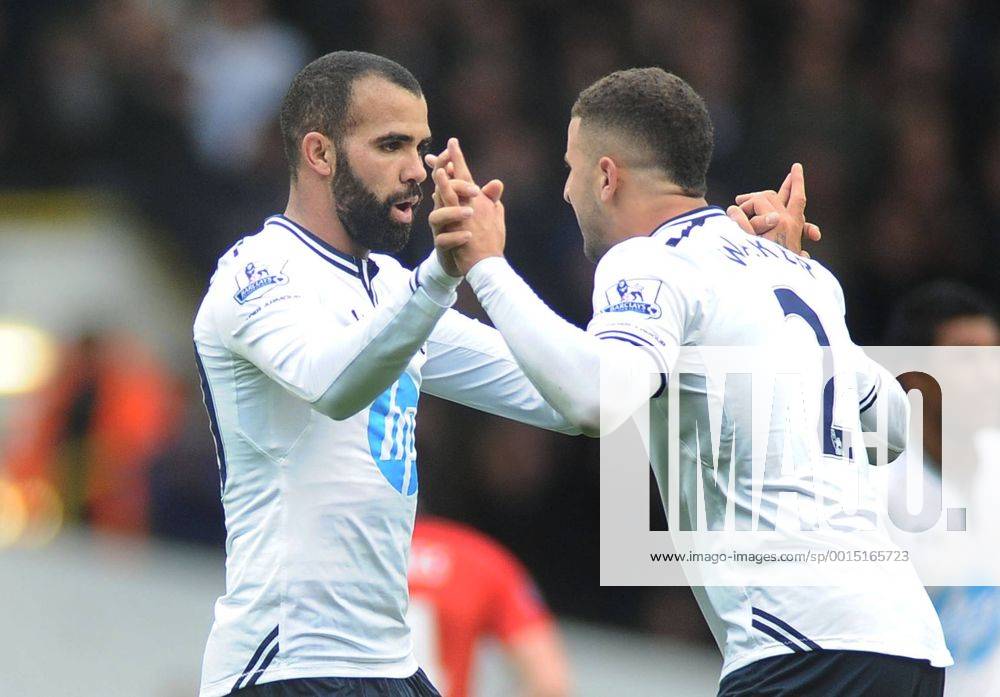 Football - 2013 2014 Premier League - Tottenham Hotspur vs. Manchester United Tottenham s Sandro celebrates scoring his goal with Kyle Walker at White Hart Lane. COLORSPORT ANDREW COWIE