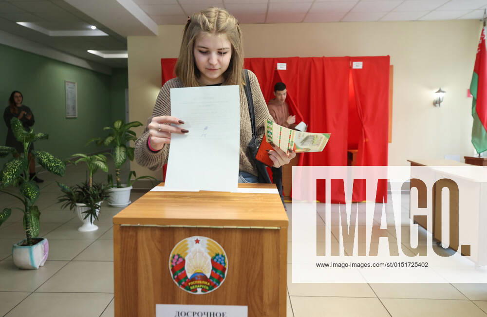 A woman casts her ballot at polling station No 65 at the Grodno Regional Institute of Education Development with the start of early voting in the 2022 Belarusian constitutional referendum, which is scheduled for February 27. Leonid Shcheglov BelTA TASS TS124EA1