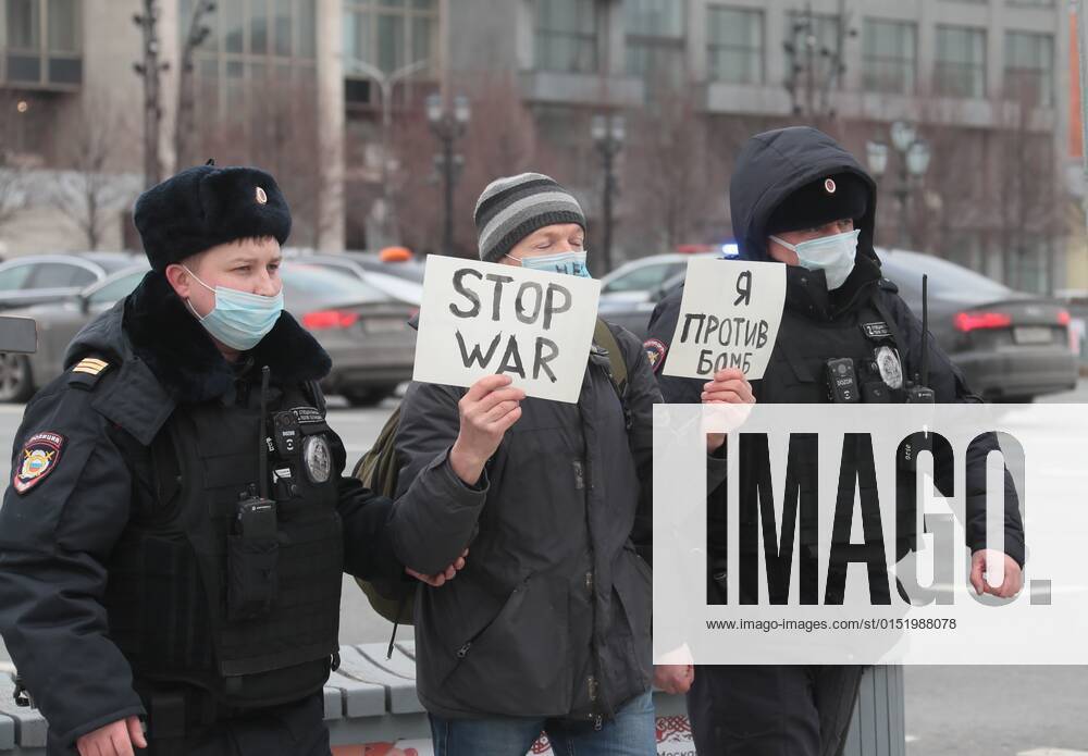 Russia Ukraine Military Operation Protest 8125299 24.02.2022 Police officers detain a participant of a single picket of an anti-war protest against Russia s military operation in Ukraine, on Pushkin Square in Moscow, Russia. Vitaliy Belousov Sputnik Moscow Russia