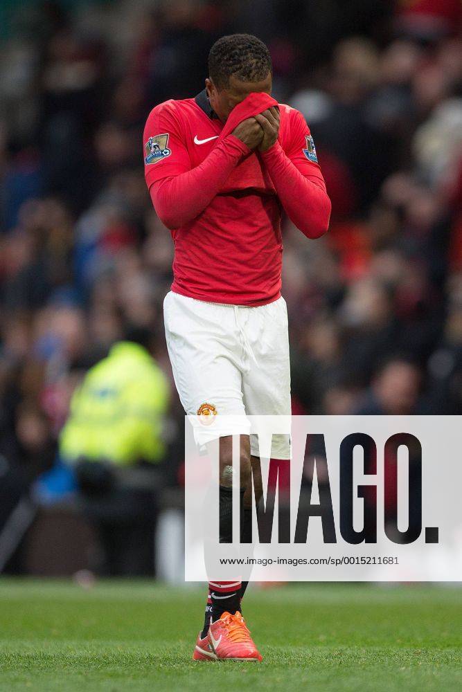 Patrice Evra of Manchester United looks dejected as he leaves the pitch following defeat - Manchester United vs. Newcastle United - Barclays Premier League - Old Trafford - Manchester - 04 12 2013 Pic Philip Oldham Sportimage .
