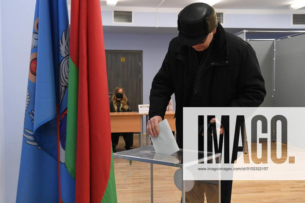 Belarus Constitutional Referendum 8127643 27.02.2022 A man casts his ballot during a voting in a referendum on amendments to the Belorussian constitution at a polling station in Minsk, Belarus. Alexandr Kryazhev Sputnik Minsk Belarus
