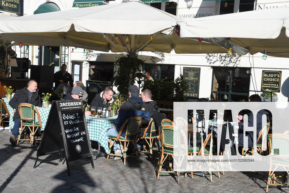 Copenhagen Denmark.04..March 2022 .Torits enjoy sun shine weather boat cruising enjoy food and drinks at cafe adn bars and restaurant on Nyhavn canal in danish capital. (Photo..Francis Dean Dean Pictures)