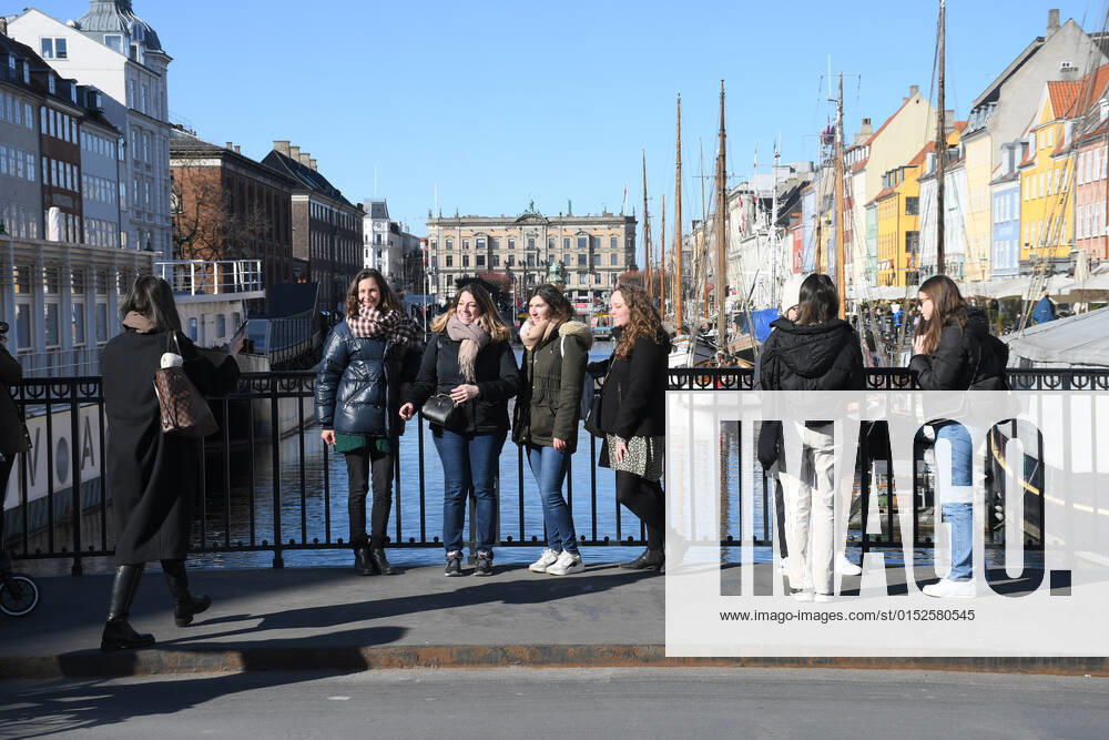 Copenhagen Denmark.04..March 2022 .Torits enjoy sun shine weather boat cruising enjoy food and drinks at cafe adn bars and restaurant on Nyhavn canal in danish capital. (Photo..Francis Dean Dean Pictures)