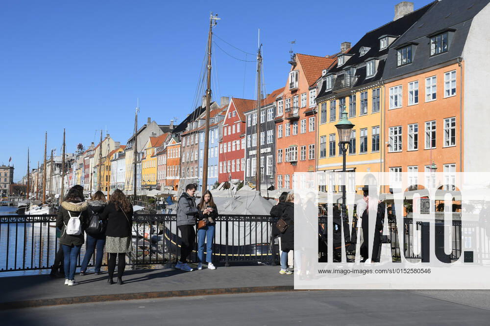 Copenhagen Denmark.04..March 2022 .Torits enjoy sun shine weather boat cruising enjoy food and drinks at cafe adn bars and restaurant on Nyhavn canal in danish capital. (Photo..Francis Dean Dean Pictures)