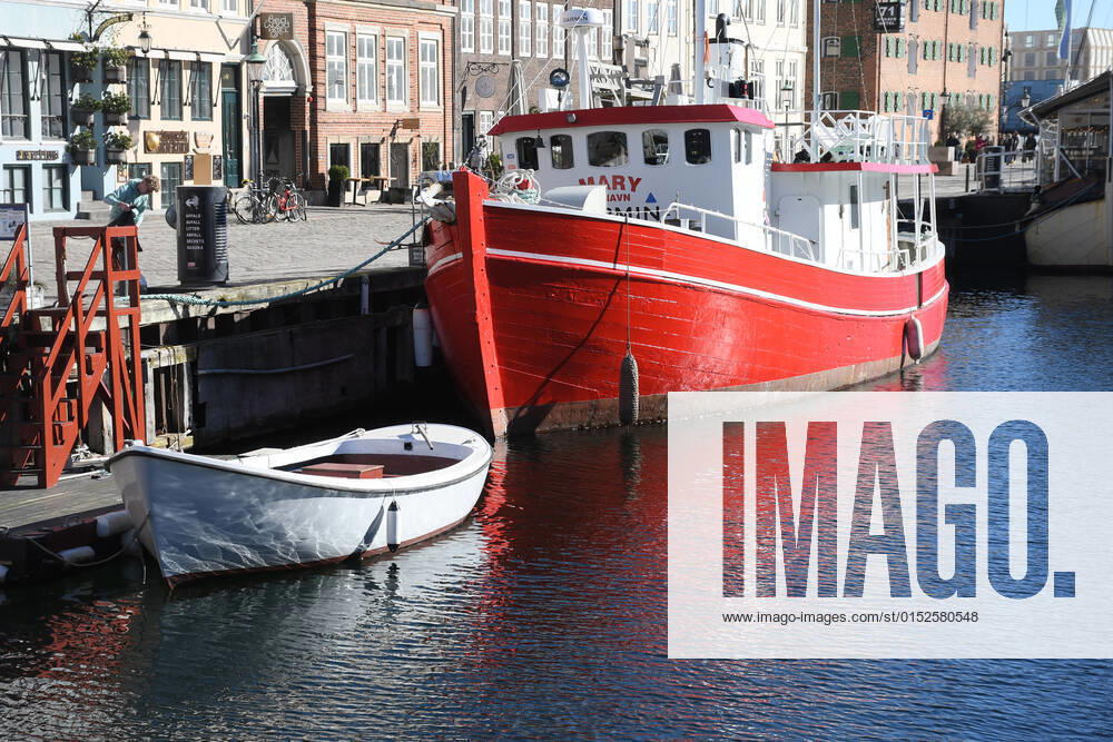 Copenhagen Denmark.04..March 2022 .Torits enjoy sun shine weather boat cruising enjoy food and drinks at cafe adn bars and restaurant on Nyhavn canal in danish capital. (Photo..Francis Dean Dean Pictures)