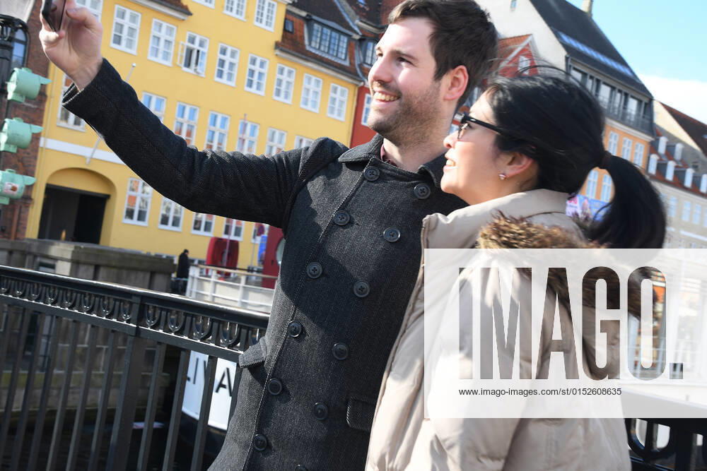 Copenhagen Denmark.06..March 2022 .Torits enjoy sun shine weather boat cruising enjoy food and drinks at cafe adn bars and restaurant on Nyhavn canal in danish capital. (Photo..Francis Dean Dean Pictures)