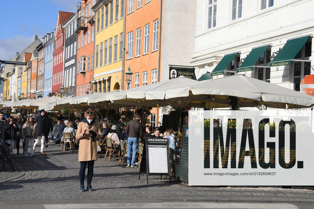 Copenhagen Denmark.06..March 2022 .Torits enjoy sun shine weather boat cruising enjoy food and drinks at cafe adn bars and restaurant on Nyhavn canal in danish capital. (Photo..Francis Dean Dean Pictures)