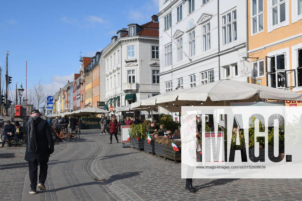 Copenhagen Denmark.06..March 2022 .Torits enjoy sun shine weather boat cruising enjoy food and drinks at cafe adn bars and restaurant on Nyhavn canal in danish capital. (Photo..Francis Dean Dean Pictures)