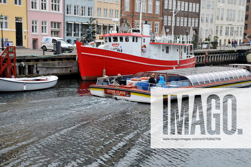 Copenhagen Denmark.08 March 2022 .Torits enjoy sun shine weather boat cruising enjoy food and drinks at cafe adn bars and restaurant on Nyhavn canal in danish capital. (Photo..Francis Dean Dean Pictures)