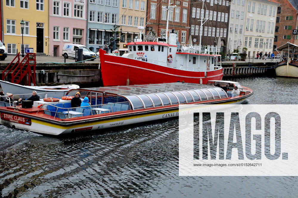 Copenhagen Denmark.08 March 2022 .Torits enjoy sun shine weather boat cruising enjoy food and drinks at cafe adn bars and restaurant on Nyhavn canal in danish capital. (Photo..Francis Dean Dean Pictures)