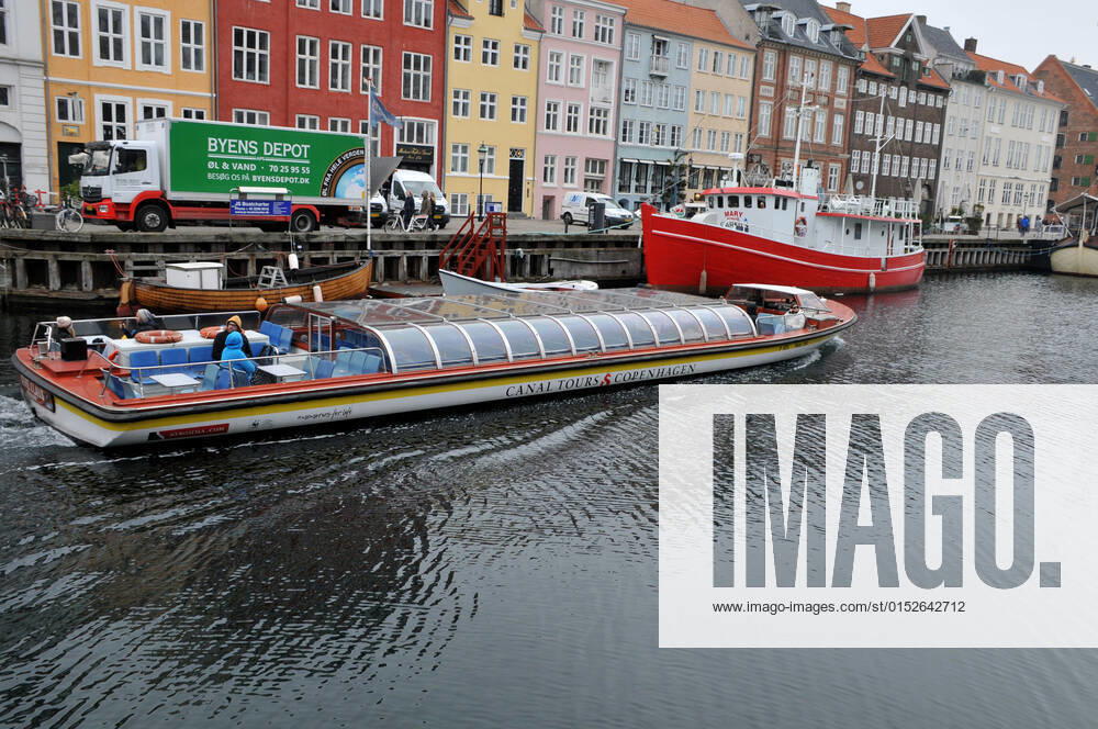Copenhagen Denmark.08 March 2022 .Torits enjoy sun shine weather boat cruising enjoy food and drinks at cafe adn bars and restaurant on Nyhavn canal in danish capital. (Photo..Francis Dean Dean Pictures)