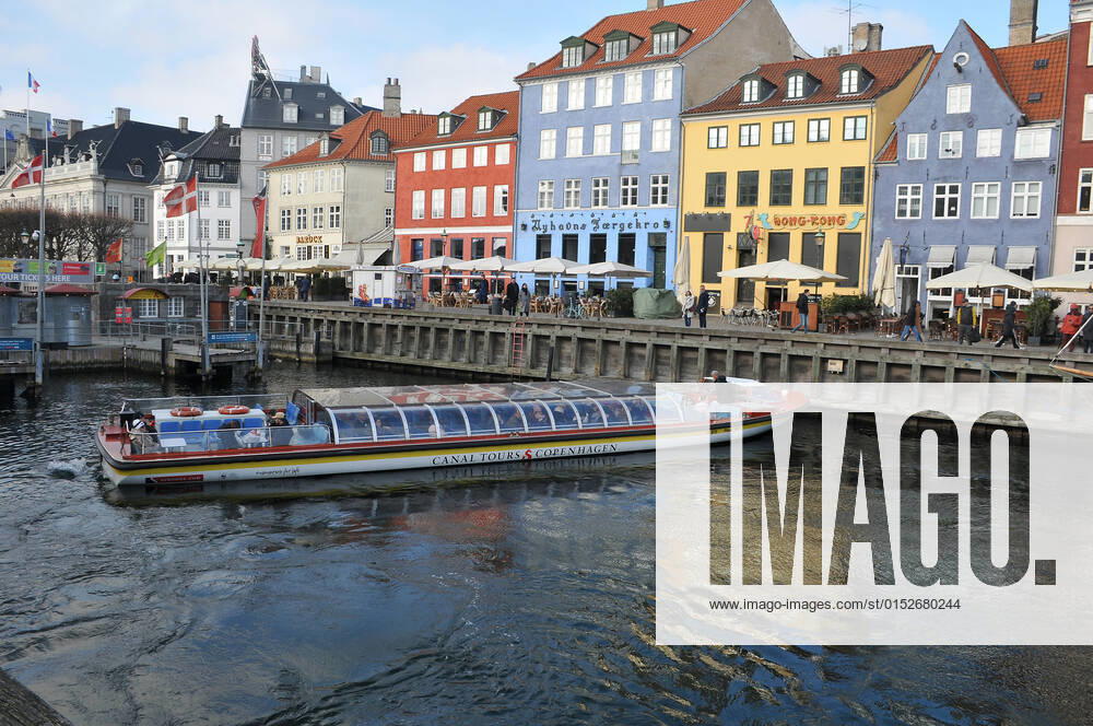 Copenhagen Denmark.10 March 2022 .Torits enjoy sun shine weather boat cruising enjoy food and drinks at cafe adn bars and restaurant on Nyhavn canal in danish capital. (Photo..Francis Dean Dean Pictures)