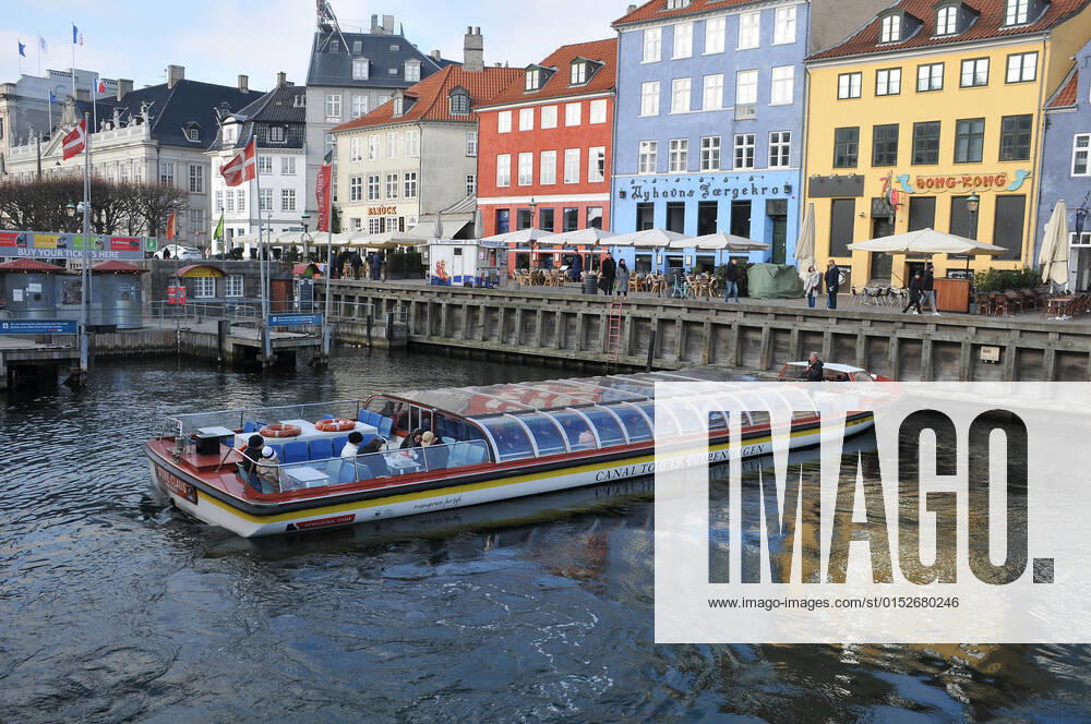 Copenhagen Denmark.10 March 2022 .Torits enjoy sun shine weather boat cruising enjoy food and drinks at cafe adn bars and restaurant on Nyhavn canal in danish capital. (Photo..Francis Dean Dean Pictures)