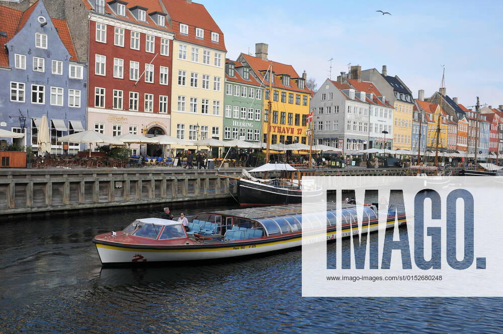 Copenhagen Denmark.10 March 2022 .Torits enjoy sun shine weather boat cruising enjoy food and drinks at cafe adn bars and restaurant on Nyhavn canal in danish capital. (Photo..Francis Dean Dean Pictures)