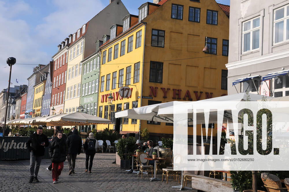Copenhagen Denmark.10 March 2022 .Torits enjoy sun shine weather boat cruising enjoy food and drinks at cafe adn bars and restaurant on Nyhavn canal in danish capital. (Photo..Francis Dean Dean Pictures)
