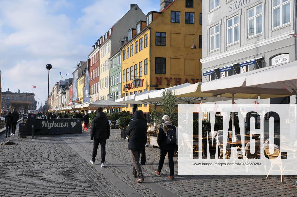 Copenhagen Denmark.10 March 2022 .Torits enjoy sun shine weather boat cruising enjoy food and drinks at cafe adn bars and restaurant on Nyhavn canal in danish capital. (Photo..Francis Dean Dean Pictures)