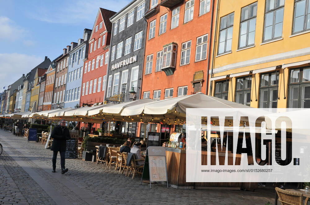 Copenhagen Denmark.10 March 2022 .Torits enjoy sun shine weather boat cruising enjoy food and drinks at cafe adn bars and restaurant on Nyhavn canal in danish capital. (Photo..Francis Dean Dean Pictures)