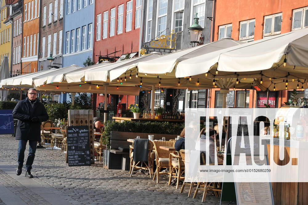 Copenhagen Denmark.10 March 2022 .Torits enjoy sun shine weather boat cruising enjoy food and drinks at cafe adn bars and restaurant on Nyhavn canal in danish capital. (Photo..Francis Dean Dean Pictures)