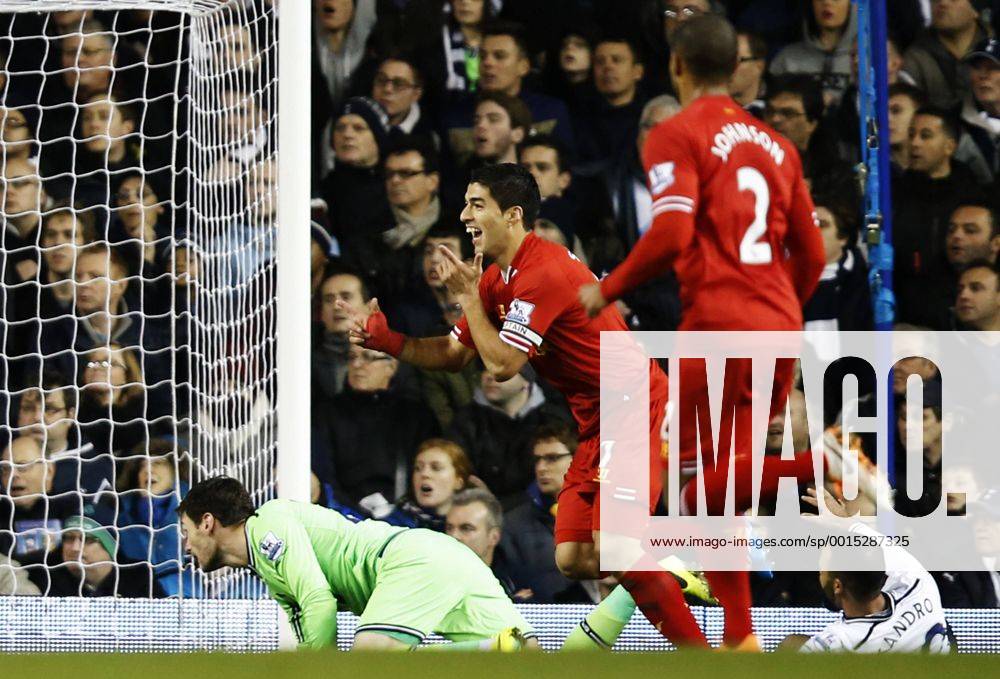 Luis Suarez of Liverpool celebrates scoring their first goal during the Barclays Premier League match between Tottenham Hotspur and Liverpool at White Hart Lane in London, Britain on Dec. 15, 2013. Liverpool won 5-0. (Xinhua Wang Lili) FOR . NOT FOR SALE FOR MARKETING OR ADVERTISING CAMPAIGNS. NO USE WITH UNAUTHORIZED AUDIO, VIDEO, DATA, FIXTURE LISTS, CLUB LEAGUE LOGOS OR LIVE SERVICES. ONLINE IN-MATCH USE LIMITED TO 45 IMAGES, NO VIDEO EMULATION. NO USE IN BETTING, GAMES OR SINGLE CLUB LEAGUE PLAYER PUBLICATIONS. (SP)BRITAIN-LONDON-SOCCER-PREMIER LEAGUE-TOTTENHAM HOTSPUR VS LIVERPOOL