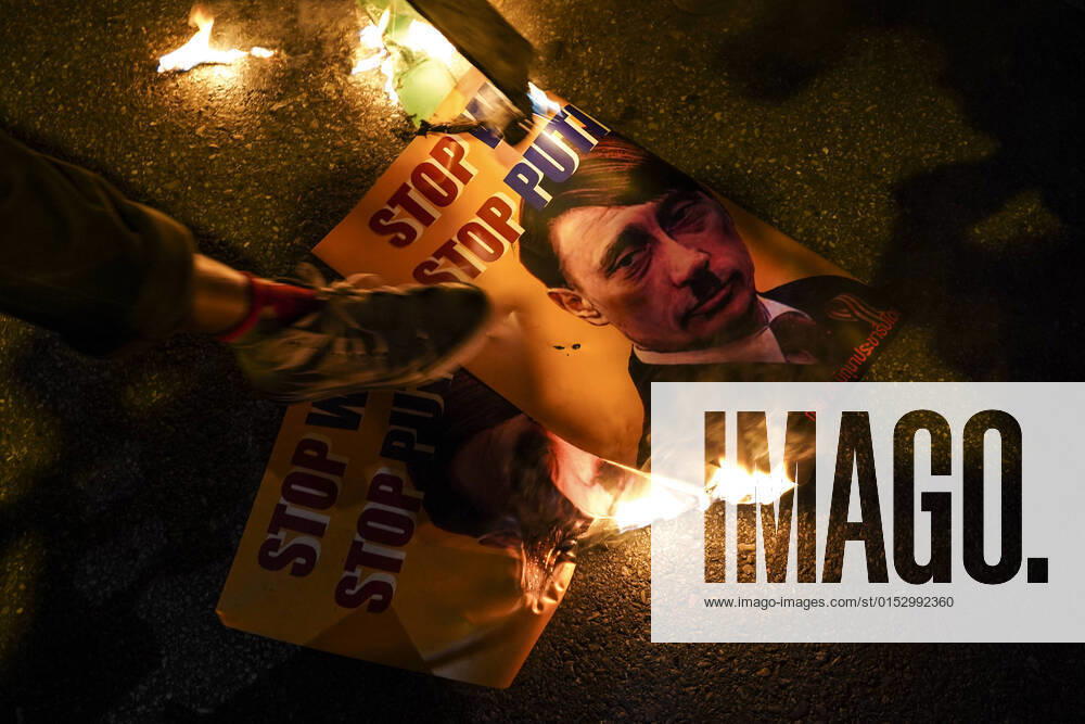 Protest In Thailand Against Russia s Invasion Of Ukraine. Protesters burn up portraits of President of Russia Vladimir Putin during a demonstration against Russia s invasion of Ukraine outside the Russian Embassy in Bangkok, Thailand, 19 March 2022. Bangkok Bangkok Thailand