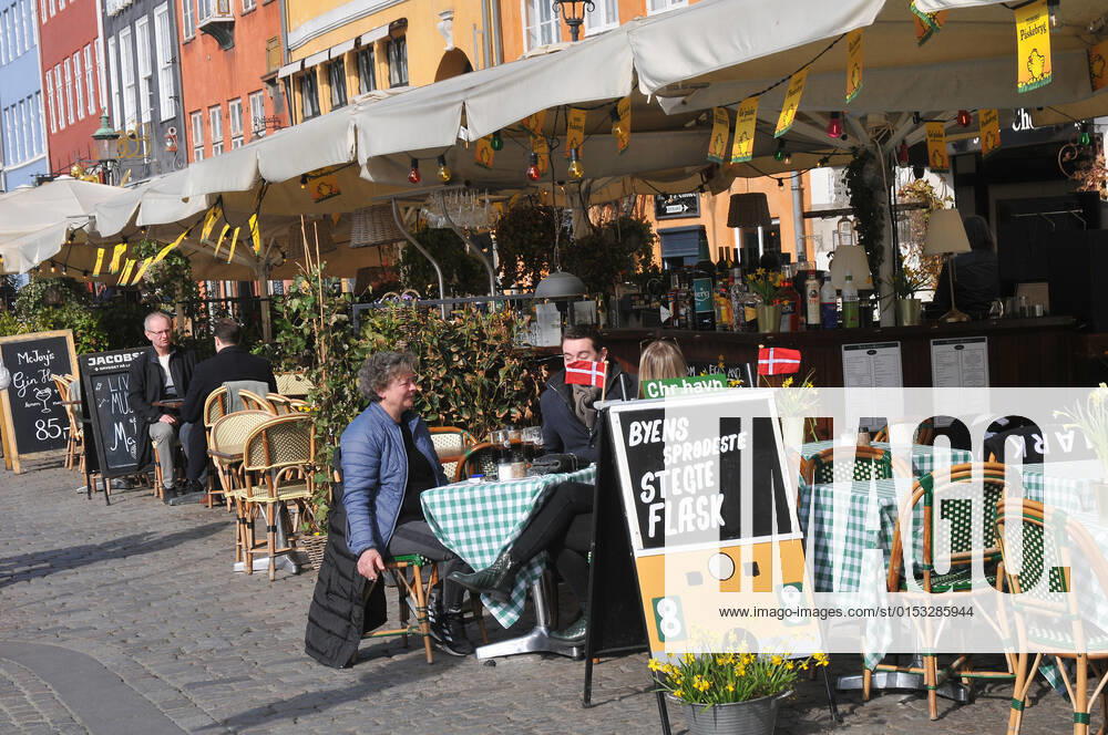 Copenhagen Denmark.22 March 2022 .Torits enjoy sun shine weather boat cruising enjoy food and drinks at cafe adn bars and restaurant on Nyhavn canal in danish capital. (Photo..Francis Dean Dean Pictures)