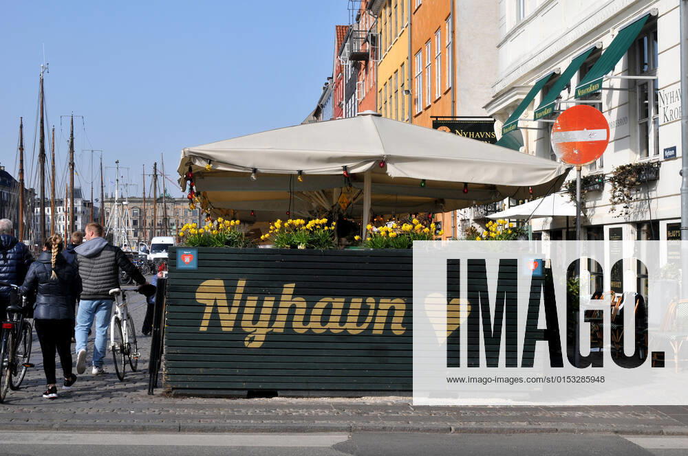 Copenhagen Denmark.22 March 2022 .Torits enjoy sun shine weather boat cruising enjoy food and drinks at cafe adn bars and restaurant on Nyhavn canal in danish capital. (Photo..Francis Dean Dean Pictures)