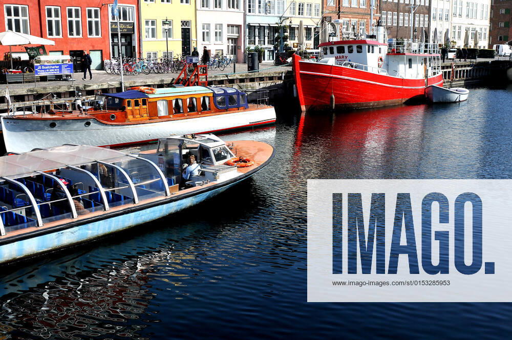 Copenhagen Denmark.22 March 2022 .Torits enjoy sun shine weather boat cruising enjoy food and drinks at cafe adn bars and restaurant on Nyhavn canal in danish capital. (Photo..Francis Dean Dean Pictures)