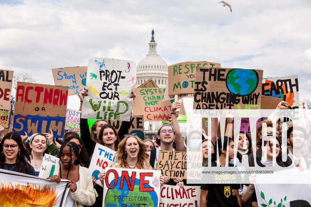 Global Climate Strike in Washington, DC Protesters at the end of a strike against climate change by the youth-led organization, Fridays for Future, at the US Capitol. This event was one of many held worldwide March 25 by FFF, the global organization begun by Greta Thunberg in 2018. Protesters are demanding policymakers and the private sector take action against the climate crisis and reparations for the ordinary people - primarily in the global south - who have been hurt most by the practices responsible for climate change. Washington DC United States