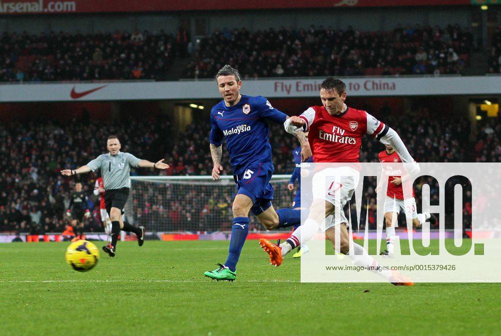 Arsenal s Nacho Monreal fires in a shot Arsenal vs Cardiff - Premier League - Emirates Stadium- London - England - 01 01 2014 - Pic David Klein Sportimage .