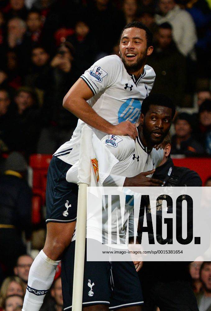 Emmanuel Adebayor of Tottenham celebrates his goal with Mousa Dembele of Tottenham - Barclays Premier League - Manchester Utd vs Tottenham - Old Trafford Stadium - Manchester - England - 1st January 2014 - Picture Simon Bellis Sportimage .