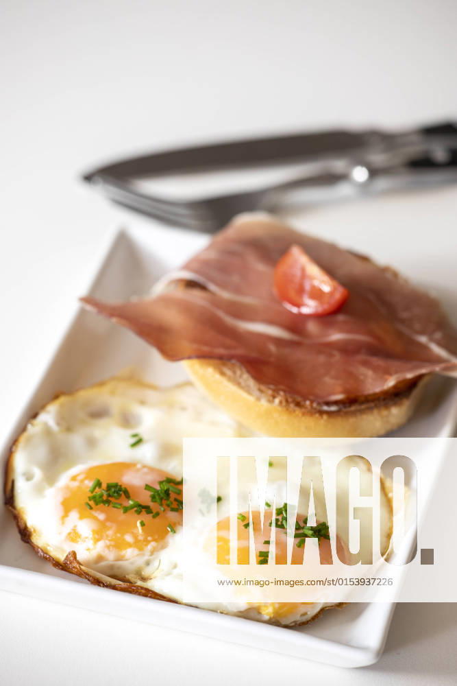 Eggs sunny side up on rye bread, model released, , property released, , 33863064.jpg, egg, wood, ham, pickle, cucumber, gherkin, sunny side up, healthy, meal, food, eating, bread, yellow, breakfast, morning, yolk, white, fried, cooked, table, pepper, fresh, coffee, green, cooking, plate, snack, background, traditional, nutrition, toast, sunny, protein, gourmet, rye, wooden, culinary, appetizer, vegetable, serving, cholesterol, lifestyle, vintage, eggs, seasoning, wholegrain, toasted, rustic, organic, sandwich,