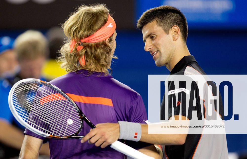 TENNIS - ATP, Australian Open 2014 MELBOURNE,AUSTRALIEN,13.JAN.14 - TENNIS - ATP Tennis Herren World Tour, Grand Slam, Australian Open. Bild zeigt Lukas Lacko (SVK) und Novak Djokovic (SRB).