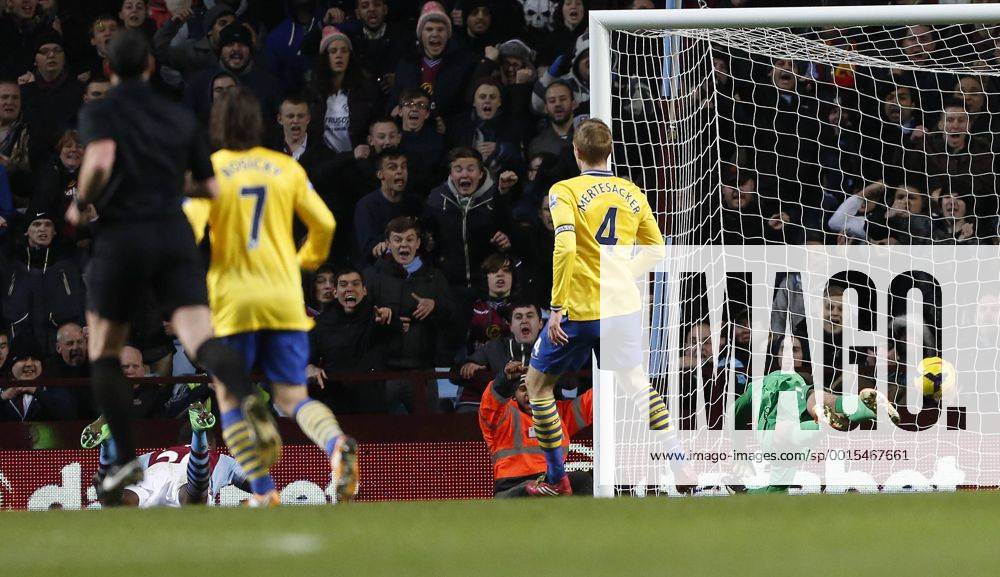 Aston Villa s Christian Benteke scoring his sides opening goal Aston Villa - Arsenal FC London. Premier League - Villa Park- Birmingham - England - 13 01 2014 - PicxDavidxKleinxSportimagex .