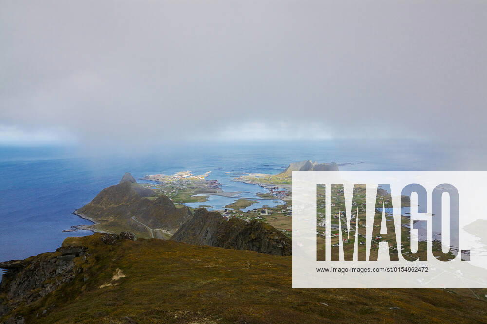Scenic view of town Sorland on Lofoten islands in Norway on cloudy day , 7979206.jpg, arctic, clouds, island, mist, mountain, north, Norway, norwegian, Ocean, panorama, peak, picturesque, Scandinavia, scenery, scenic, sea, Sorland, town, Vaeroy, view, village,