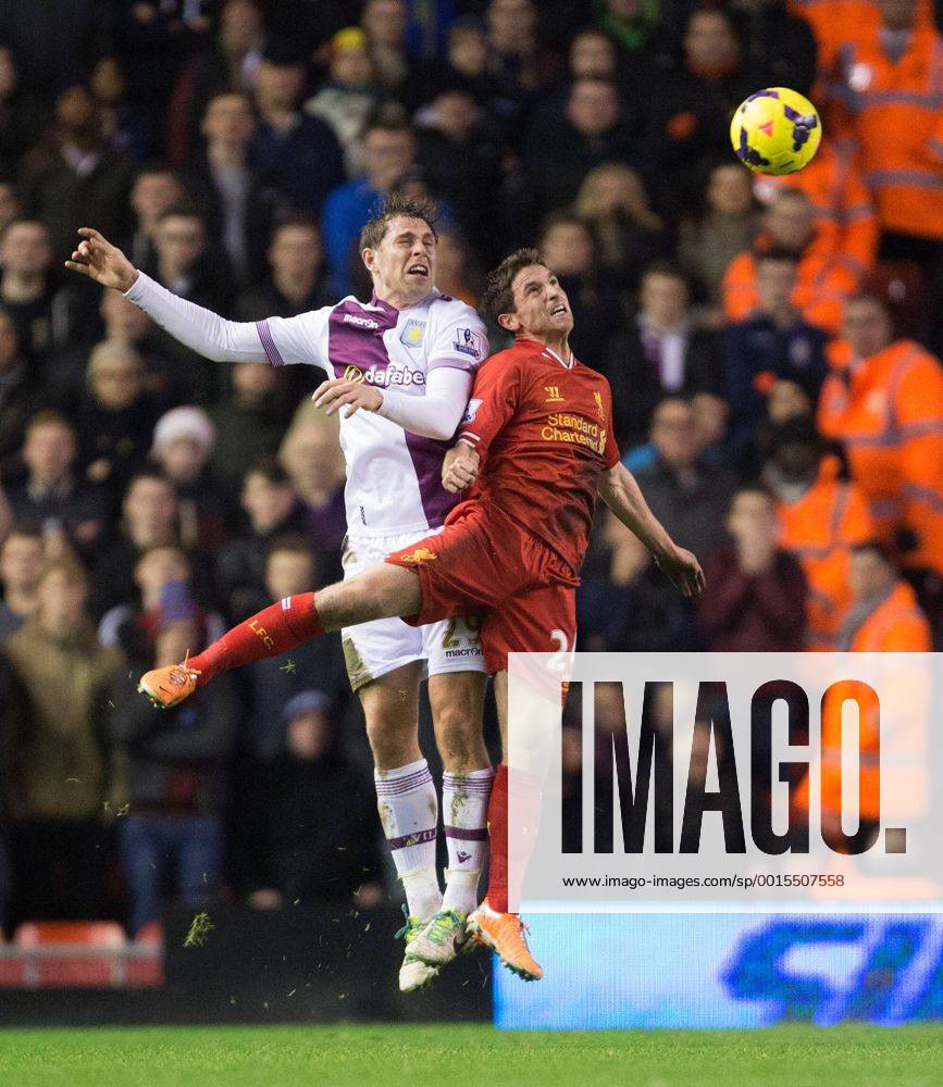 Grant Holt of Aston Villa battles Joe Allen of Liverpool for a high ball - Liverpool FC vs. Aston Villa - Barclays Premier League - Anfield - Liverpool - 18 01 2014 Pic PhilipxOldham Sportimage .