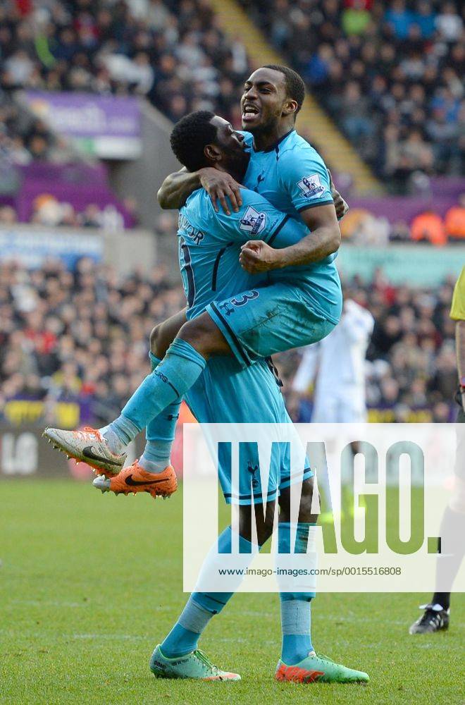 Emmanuel Adebayor of Tottenham celebrates the third goal with Danny Rose of Tottenham - Barclays Premier League - Swansea City vs Tottenham Hotspur - Liberty Stadium - Swansea - Wales - 19th January 2014 - .