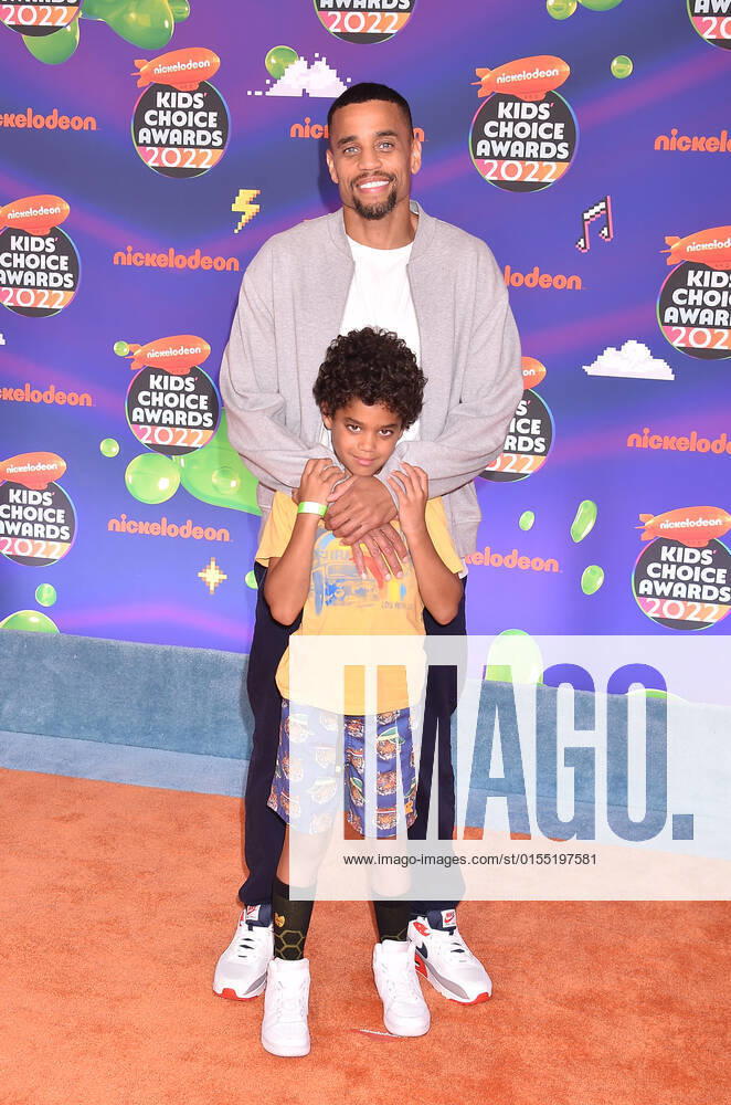 SANTA MONICA, CA - APRIL 9: Michael Ealy and Elijah Brown at the 2022 Nickelodeon Kids Choice Awards at the Barker Hangar in Santa Monica, California on April 9, 2022.