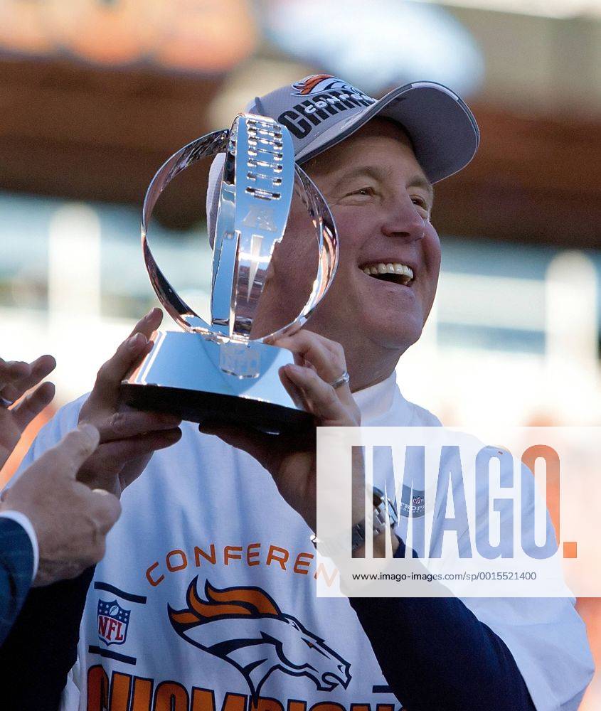 Jan. 19, 2014 - Denver, Colorado, U.S - Broncos Head Coach JOHN FOX celebrates with the AFC Championship Trophy at the end of the game at Sports Authority Field at Mile High during the AFC Championship Game Sunday afternoon. The Broncos beat the Patriots 26-16. NFL American Football Herren USA AFC Championship 2014 - Broncos beat the Patriots 26-16 - ZUMAion