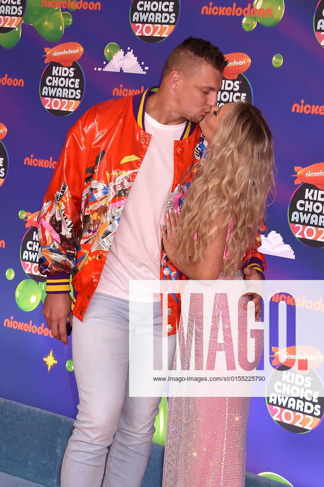SANTA MONICA, CA - APRIL 9: Rob Gronkowski and Camille Kostek at the 2022 Nickelodeon Kids Choice Awards at the Barker Hangar in Santa Monica, California on April 9, 2022.