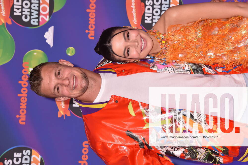 SANTA MONICA, CA - APRIL 9: Rob Gronkowski and Miranda Cosgrove at the 2022 Nickelodeon Kids Choice Awards at the Barker Hangar in Santa Monica, California on April 9, 2022.
