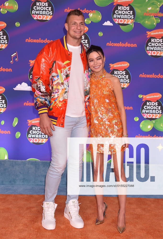 SANTA MONICA, CA - APRIL 9: Rob Gronkowski and Miranda Cosgrove at the 2022 Nickelodeon Kids Choice Awards at the Barker Hangar in Santa Monica, California on April 9, 2022.
