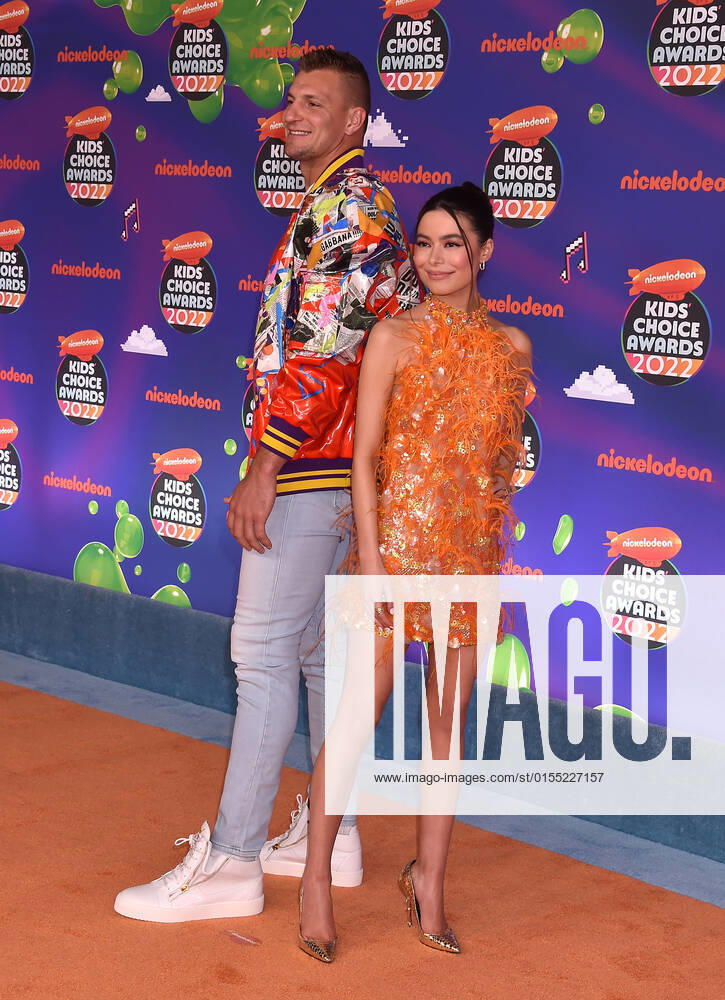 SANTA MONICA, CA - APRIL 9: Rob Gronkowski and Miranda Cosgrove at the 2022 Nickelodeon Kids Choice Awards at the Barker Hangar in Santa Monica, California on April 9, 2022.