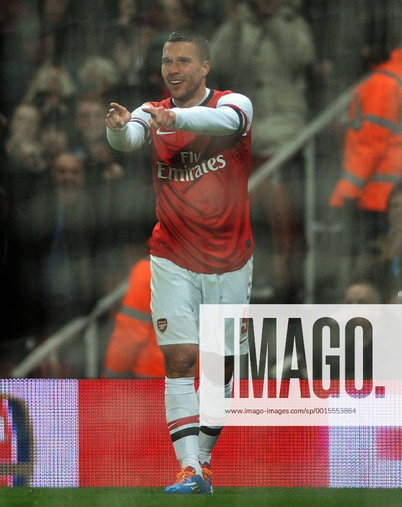 Football - 2013 2014 FA Cup - Fourth Round: Arsenal vs. Coventry City Arsenal s Lukas Podolski celebrates scoring goal no 1 at The Emirates. COLORSPORT ANDREW COWIE