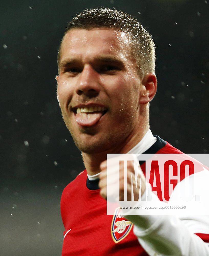 LONDON, Jan. 24, 2014 (Xinhua) -- Lukas Podolski of Arsenal celebrates scoring his second goal during FA Cup Fourth Round match between Arsenal and Coventry City at Emirates Stadium in London, Britain on Jan. 24, 2014.