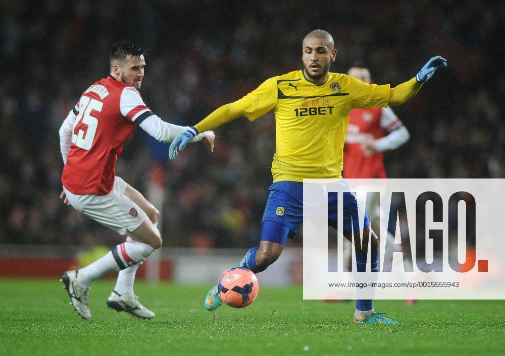 Football - 2013 2014 FA Cup - Fourth Round: Arsenal vs. Coventry City Leon Clarke - Coventry Arsenal s Carl Jenkinson at The Emirates. COLORSPORT ANDREW COWIE