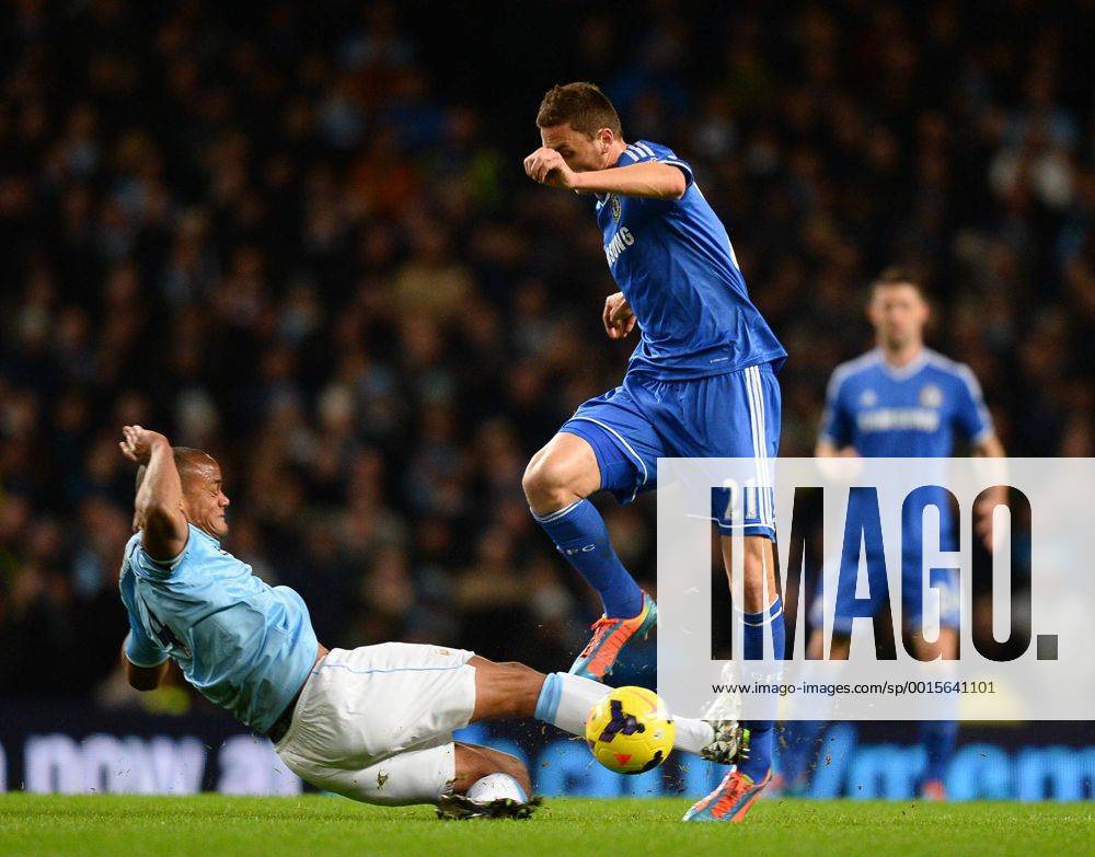 Vincent Kompany of Manchester City catches Nemanja Matic of Chelsea on the shin as he tackles him - Barclays Premier League - Manchester City vs Chelsea FC - Etihad Stadium - Manchester - England - 03rd February 2014 - .
