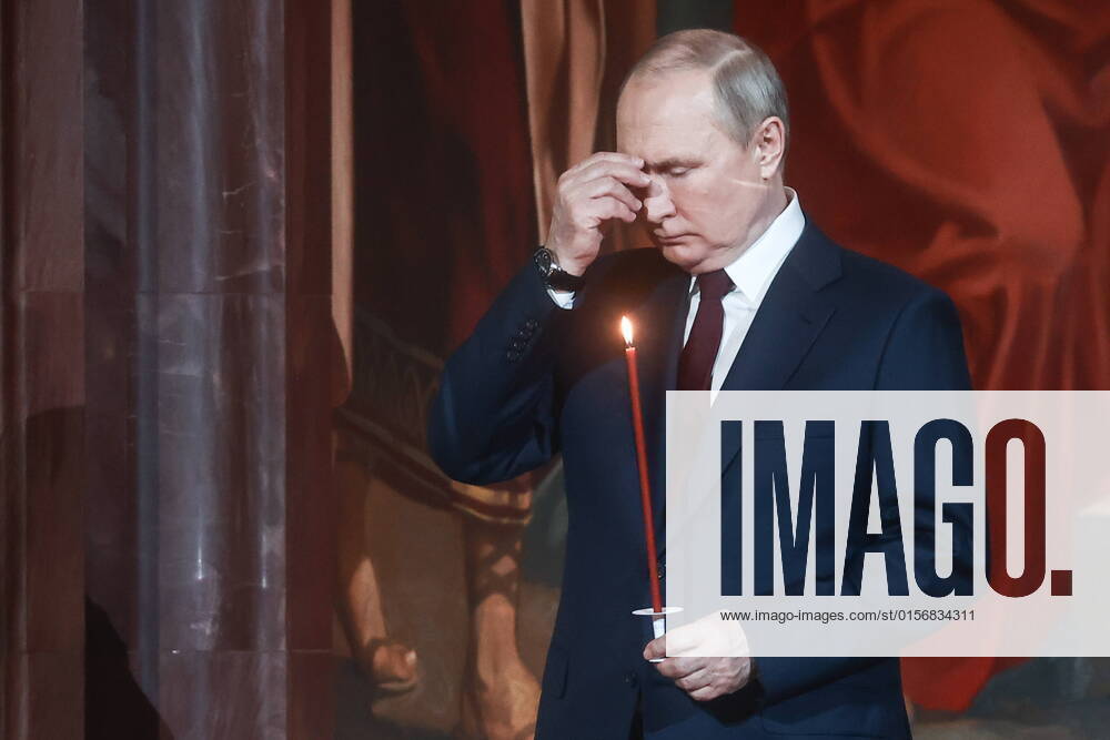 Russia s President Vladimir Putin makes a sign of the cross during an Easter service at the Cathedral of Christ the Saviour. The Russian Orthodox Church celebrates the holiday according to the Julian calendar. Sergei Fadeichev TASS TS12E20A